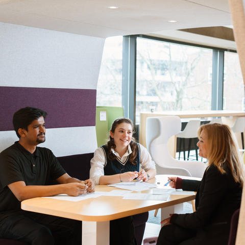 Students receive coaching in Gutman Library