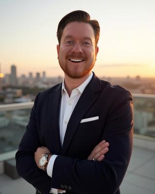 Headshot of Evan Walsh